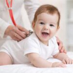 Smiling baby at a check-up